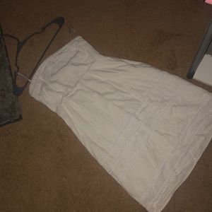 All white strapless Old Nvay dress